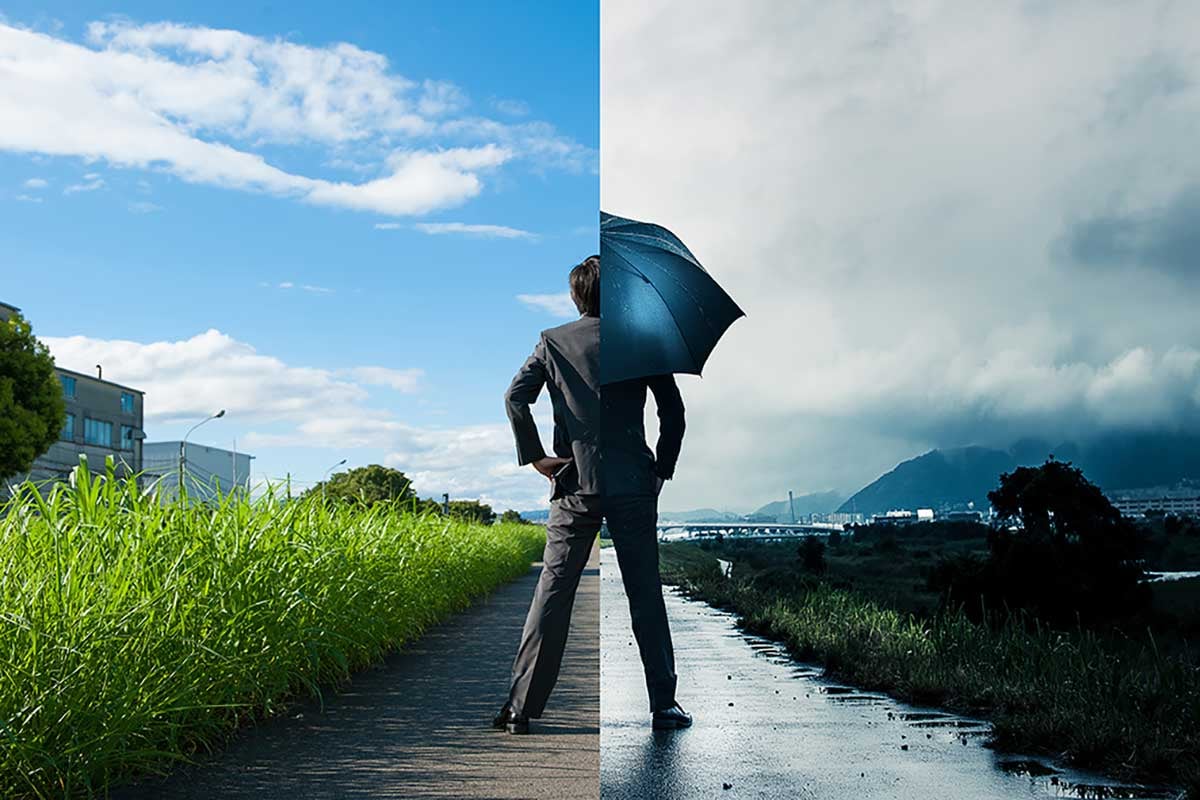 Man-standing-in-sun-and-in-rain