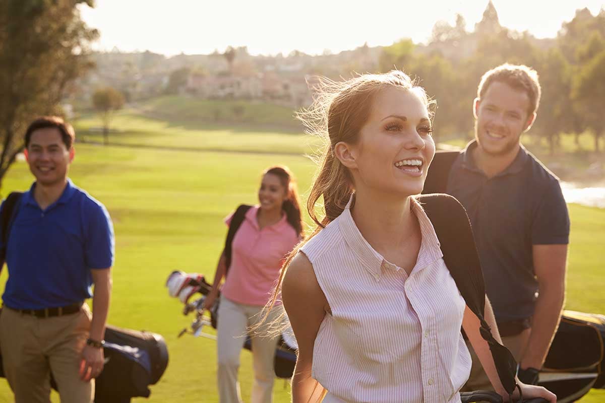 group-of-golfers-walking