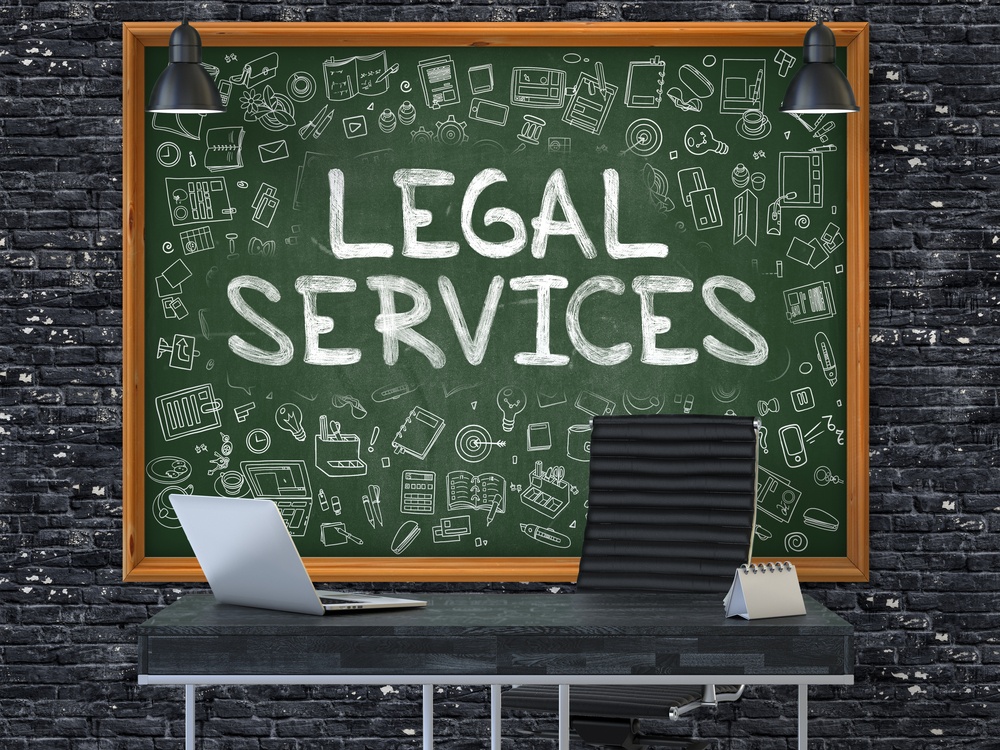 Chalkboard-in-the-Interior-of-a-Modern-Office-with-Hand-Drawn-Legal-Services