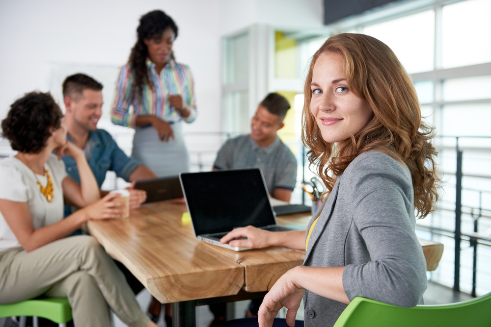 Woman_Using_Laptop_Meeting